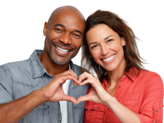 A Heartfelt Connection: An interracial couple forms a heart with their hands, embodying love, commitment, and the beauty of unity. Celebrating togetherness and affection.