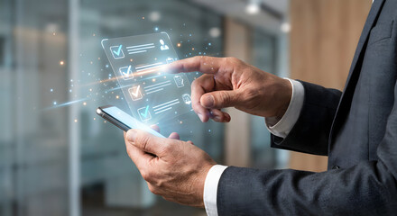 Businessman interacting with smartphone and futuristic digital interface