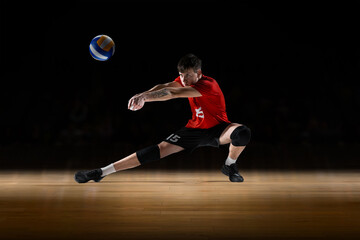 Modern mixed media shows volleyball player receiving the ball in low defensive stance. Concept of ball control training, defensive drills, athlete readiness, match preparation content.