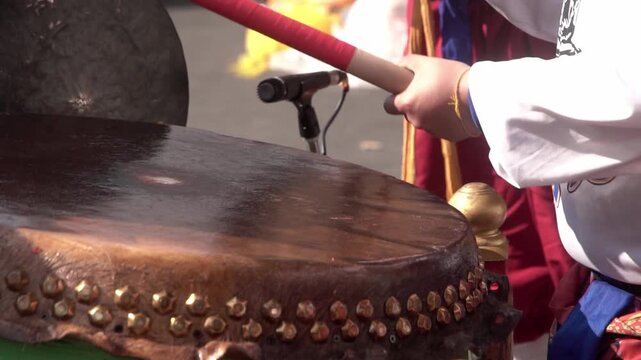 Chinese drum performance captured in slow motion.