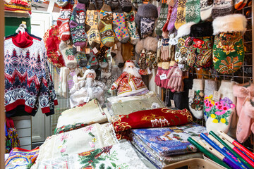 Fototapeta premium Russian souvenir hats-earflaps of different colors