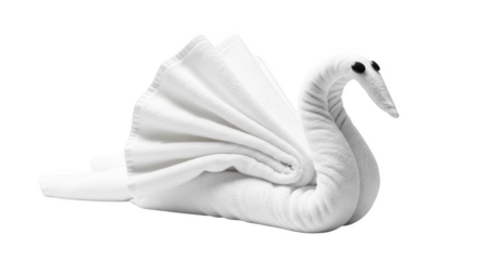 White towel folded into a swan shape with black eyes on a black background image