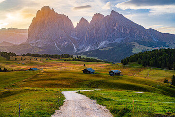 The UNESCO site Seiser Alm or Alpe di Siusi the Dolomite plateau and the largest high-elevation Alpine meadow in Europe located in Italy's South Tyrol province in the Dolomites in autumn sunrise dawn.