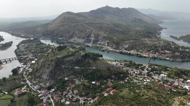 Aerial panoramic of medieval Rozafa Castle or Shkoder Castle in Shkoder. Big Tower of Bushatllij and Buna River view