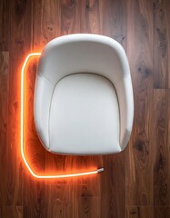 Overhead view of white chair on wood floor, highlighted with orange neon light, minimalist modern design