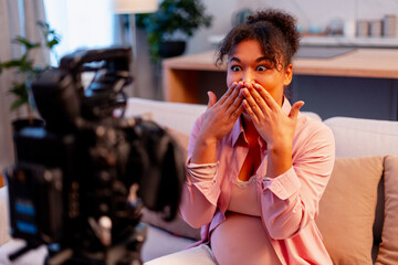 Pregnant woman recording a surprising new video for her online followers