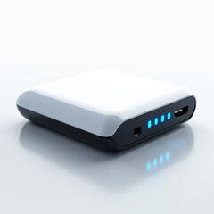 Modern compact power bank with sleek white top and black base. Four blue indicator lights show full charge. USB ports for charging devices on the go.