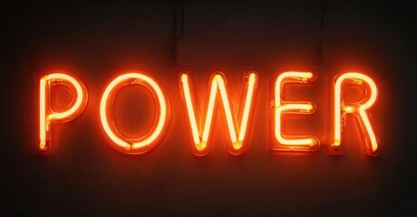Obraz premium Bright neon sign spells POWER. Orange glow contrasts dark background. Simple typography, bold letters create strong visual impact.