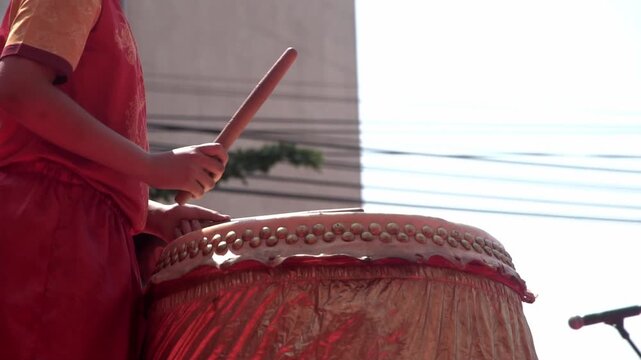 Chinese drum performance captured in slow motion.