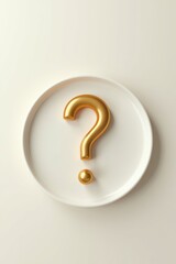 Golden question mark on white plate