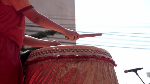 Chinese drum performance captured in slow motion.