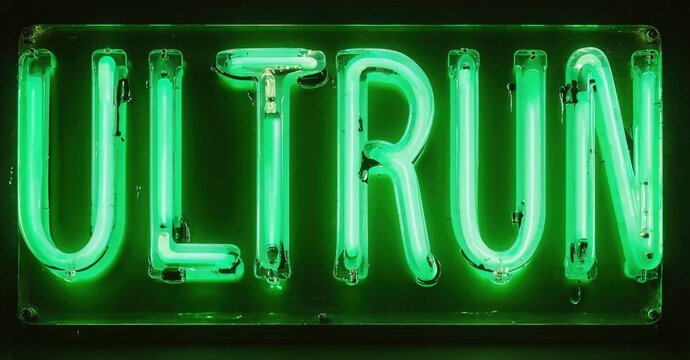 Bright green neon sign spells ULTRON against dark background. Simple design, bold letters, striking illumination. Modern aesthetic.