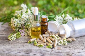 Yarrow supplements and tinctures homeopathy. Selective focus.