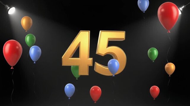 Number 45 in the spotlights with balloons in the background. Festive scene for birthday or anniversary party