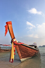 Bow is decorated with colorful  silk scarves