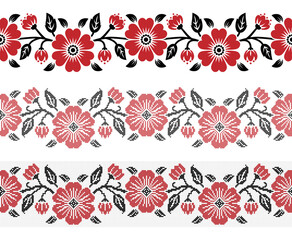 Embroidered cross stitch seamless pattern of red flowers. Vector illustration
