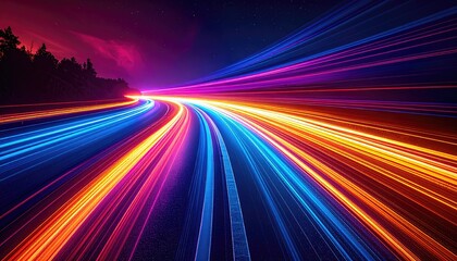 Long exposure captures light trails along a highway with a vibrant color spectrum