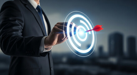 An executive's hand interacts with a shimmering virtual target, signifying sharp focus on business objectives.