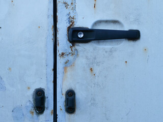 old rusty trunk door of a van