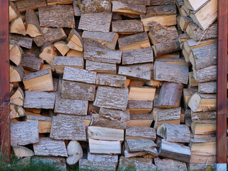 split and stacked firewood for the fireplace