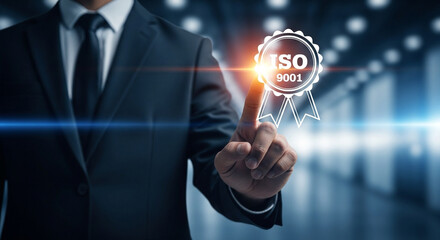 A businessman emphasizes the importance of ISO 9001 quality standards.