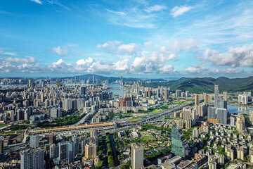 Aerial view of the dense urban buildings and river landscape in Macau.