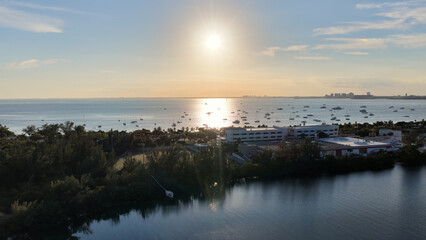Fototapeta premium Sunset Skyline At Miami In Florida United States. Sunset Beach Skyline. Downtown Landscape. Summer Travel. Sunset Skyline In Florida United States. Highrise Buildings.