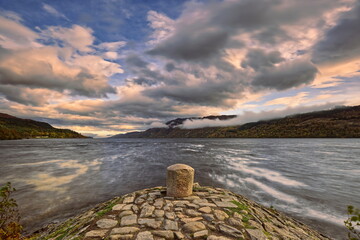 Loch Ness seen northeastward from the lookout at the Caledonian Canal and towpath start in a windy, cloudy yet bright day. Fort Augustus-Scotland-193