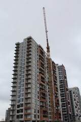 building under construction, construction site with cranes
