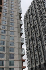 high rise apartment building, the facade of the new building
