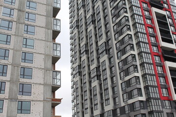 high rise apartment building, the facade of the new building