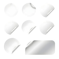 Collection of Realistic White Paper Stickers with Curled Corners.