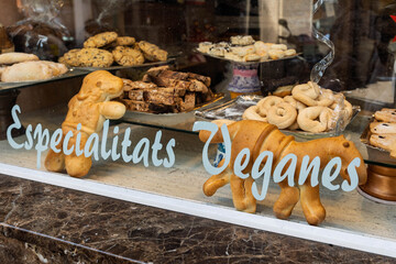Vegan Specialties Bakery Shop Window Display with Assorted Pastries