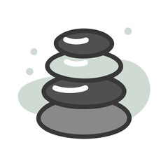 Stacked stones in serene setting