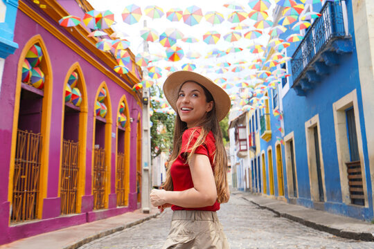 Tourism in Olinda, Brazil. Portrait of tourist woman visiting Olinda the city of famous Brazilian Carnival.