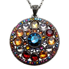 A beautiful silver pendant with colorful gemstones