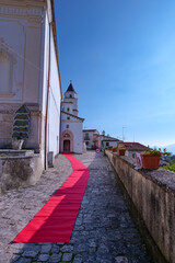 A narrow street among the old houses of Sant'Angelo d'Alife, a town in the province of Caserta, Italy.
