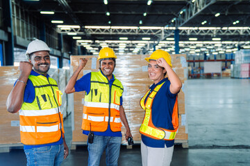 Diverse workfoce team black men,woman factory worker wear safety helmet, safety vest use tablet for industrial warehouse job.Teamwork efficient success modern logistic manufacture operation management
