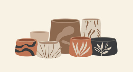 Group of stylish ceramic plant pots in different earthy colors and artistic patterns arranged together for indoor gardening inspiration.