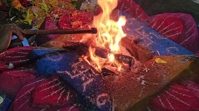 Deep spiritual devotion as a Hindu havan ceremony is performed, representing tradition, ritual worship, and cultural continuity.