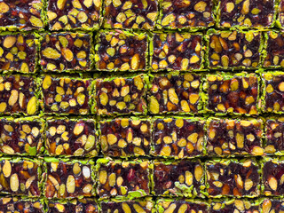 Turkish delight with pistachio pieces, a delicious dessert