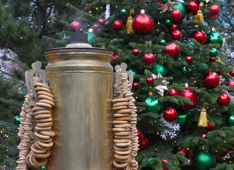 New Year's Eve decoration of street. Christmas trees with balls on branches.