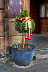SPYTKOWICE, POLAND - DECEMBER 23, 2025: Traditional Christmas decorations by the church in Spytkowice, Poland.