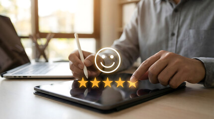 Business,man,touching,five,stars,rating,on,digital,tablet,giving,positive,feedback,with,smiley,icon,on,blurred,background,concept,of,customer,satisfaction,survey,and,service,quality,review.