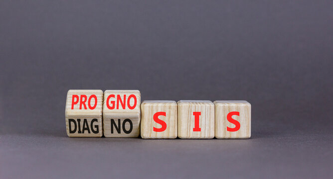 Prognosis or diagnosis symbol. Concept words Prognosis or Diagnosis on beautiful wooden blocks. Beautiful grey background. Business prognosis or diagnosis concept. Copy space.