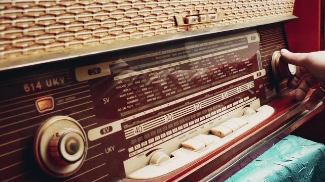 Old Radio Receiver, Nostalgic Retro Style; Turning on and searching for a radio station on an old radio