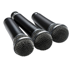 Three professional black handheld microphones arranged diagonally against a solid black background.