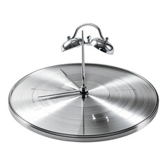 Minimalist modern silver alarm clock with brushed metal face against a black background.