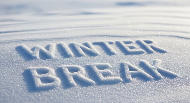Winter Break text shaped by Arctic wind in fresh snow macro telephoto