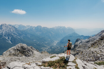 Woman Standing on Summit of Maja e Radohimes